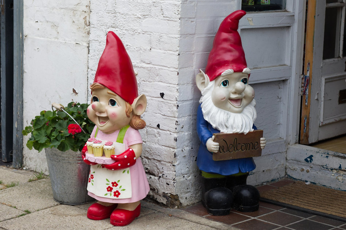Male and female gnomes by a door - Gnomeshomes